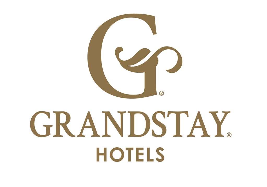 Grandstay Hotel & Suites Downtown ชีบอยแกน โลโก้ รูปภาพ